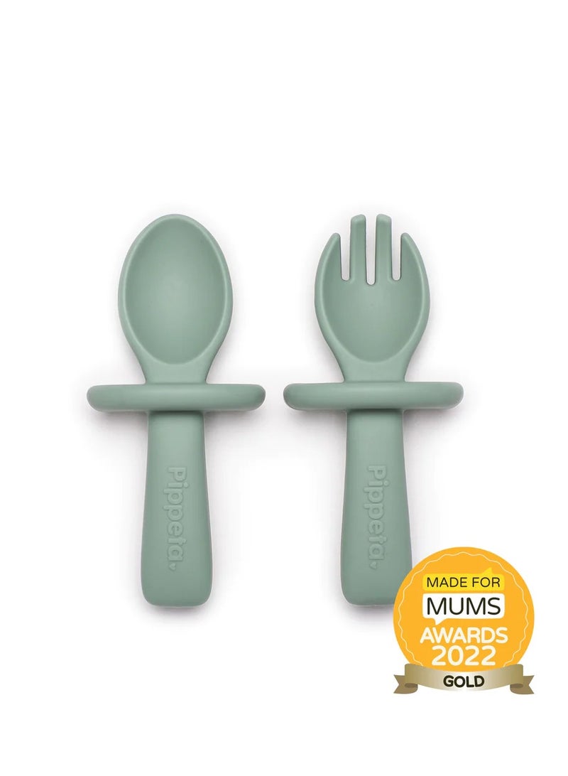 Pippeta The Pippeta My 1st Silicone Baby Spoon & Fork Set is designed to support your baby’s transition into independent eating in a safe and comfortable way. Made from BPA-free, food-grade silicone, it is soft, gentle, and perfect for early weaning stages. The easy-grip handles are sized for tiny hands, helping babies build confidence while learning to self-feed. A built-in safety guard adds extra reassurance during mealtimes. Durable and dishwasher safe, it is a practical everyday essential that combines safety, comfort, and simplicity for growing little eaters. - Image 2