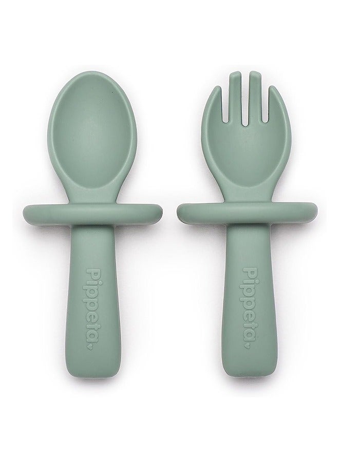 Pippeta The Pippeta My 1st Silicone Baby Spoon & Fork Set is designed to support your baby’s transition into independent eating in a safe and comfortable way. Made from BPA-free, food-grade silicone, it is soft, gentle, and perfect for early weaning stages. The easy-grip handles are sized for tiny hands, helping babies build confidence while learning to self-feed. A built-in safety guard adds extra reassurance during mealtimes. Durable and dishwasher safe, it is a practical everyday essential that combines safety, comfort, and simplicity for growing little eaters. - Image 1