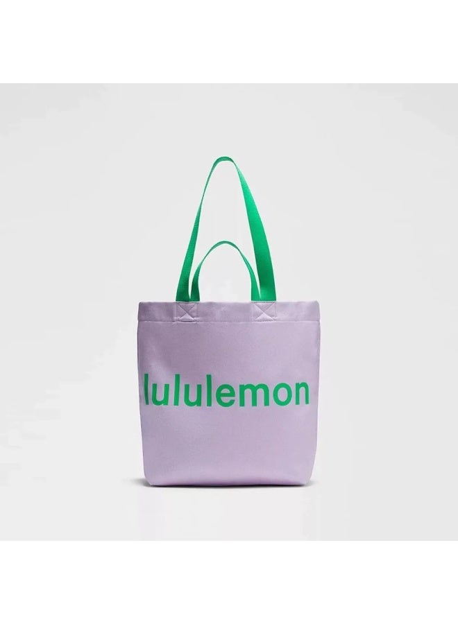 لولوليمون ​حقيبة توت قماشية سعة 17 لتر، حقيبة يوجا وجيم، حقيبة يد رياضية متعددة الوظائف، حقيبة شاطئ عادية​ - Image 1