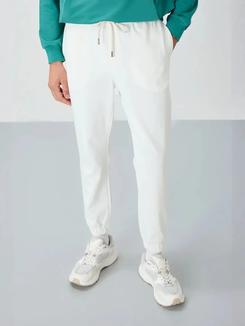 تومي لايف TOMMY Men's Regular Fit Fleece Sweatpants
