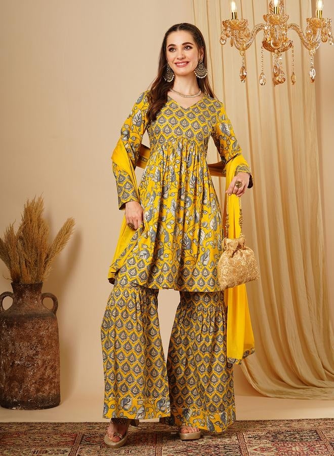 globus Globus Women Mustard Allover Floral Print Alia Cut Knee Length Kurta With Sharara & Dupatta Festive Wear Set by Styli - Image 1