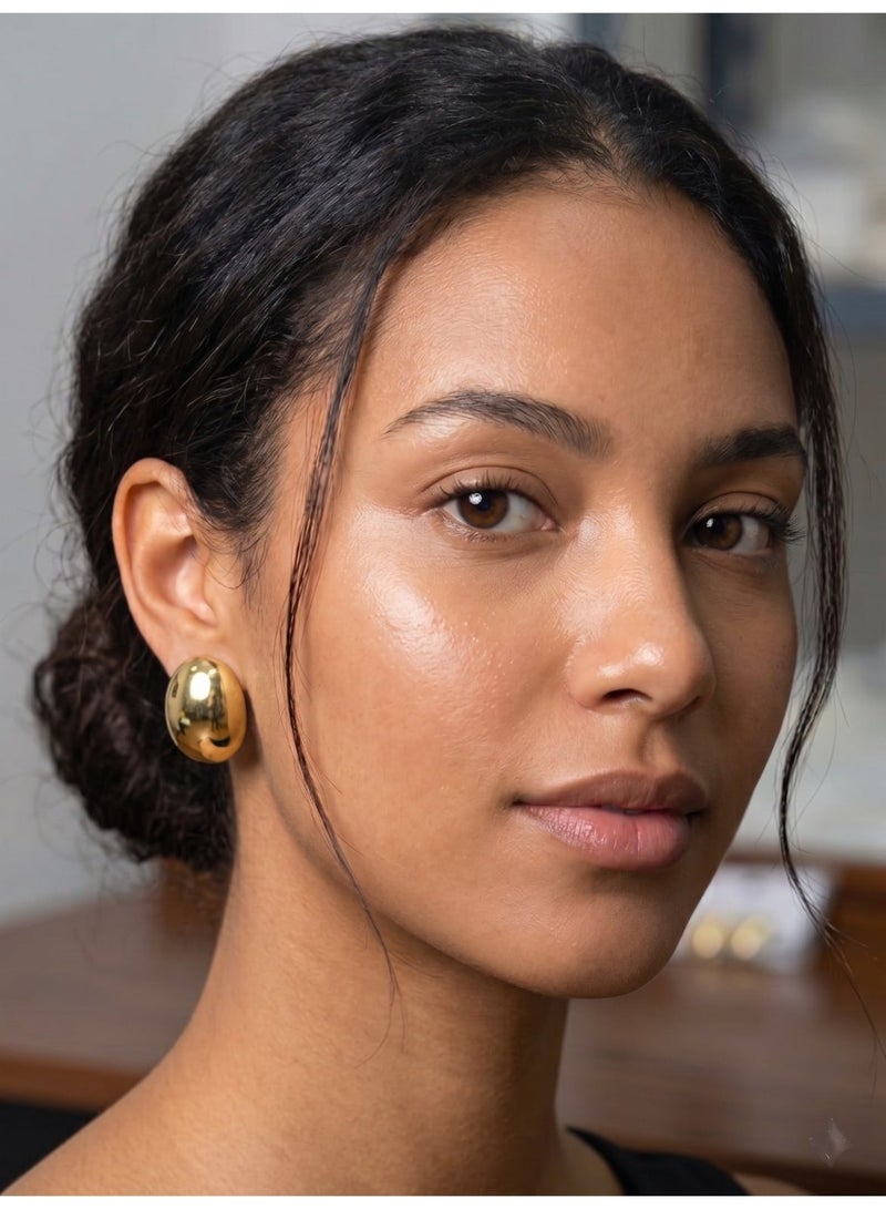 Vbranda A sophisticated pair of oval-shaped stud earrings crafted from high-grade pure stainless steel with a polished gold-tone finish - Image 2