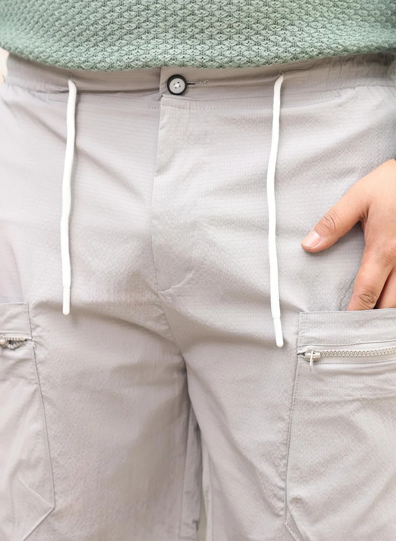 انستافاب بلس Instafab Plus Men Modular-Utility Shorts | Mid-Rise , Elasticated -Waistband | Button Closure , Straight Hem | Solid Textured | Woven Fabric For Street & Casual Wear | Coin Grey