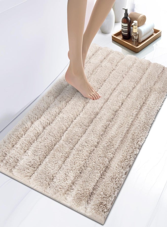 DOMUSTEX Washable Bathroom Rug 24" x 36", Extra Soft Bath Mat, Absorbent and Non Slip Bath Rug for Shower, Bathtub, Sink, Floor - Image 1