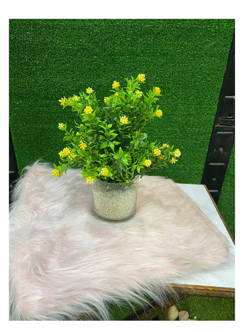 Glass vase with artificial flowers yellow for home decor