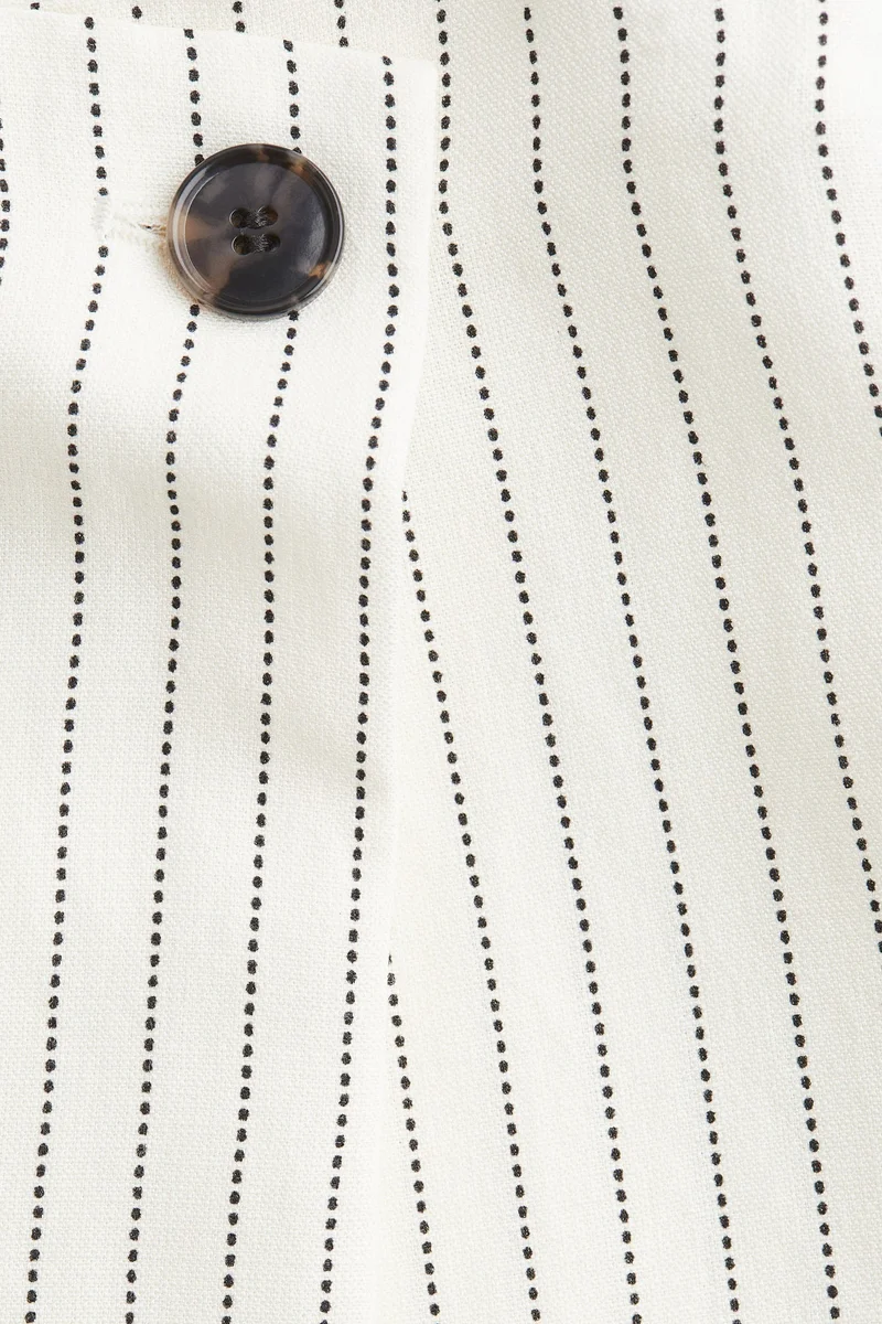 اتش اند ام تنورة بتصميم ملفوف