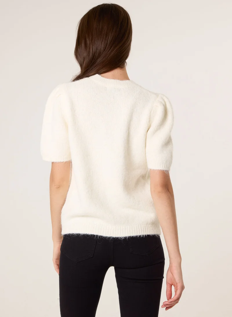 بلو فانيلا كنزة محبوكة بياقة دائرية