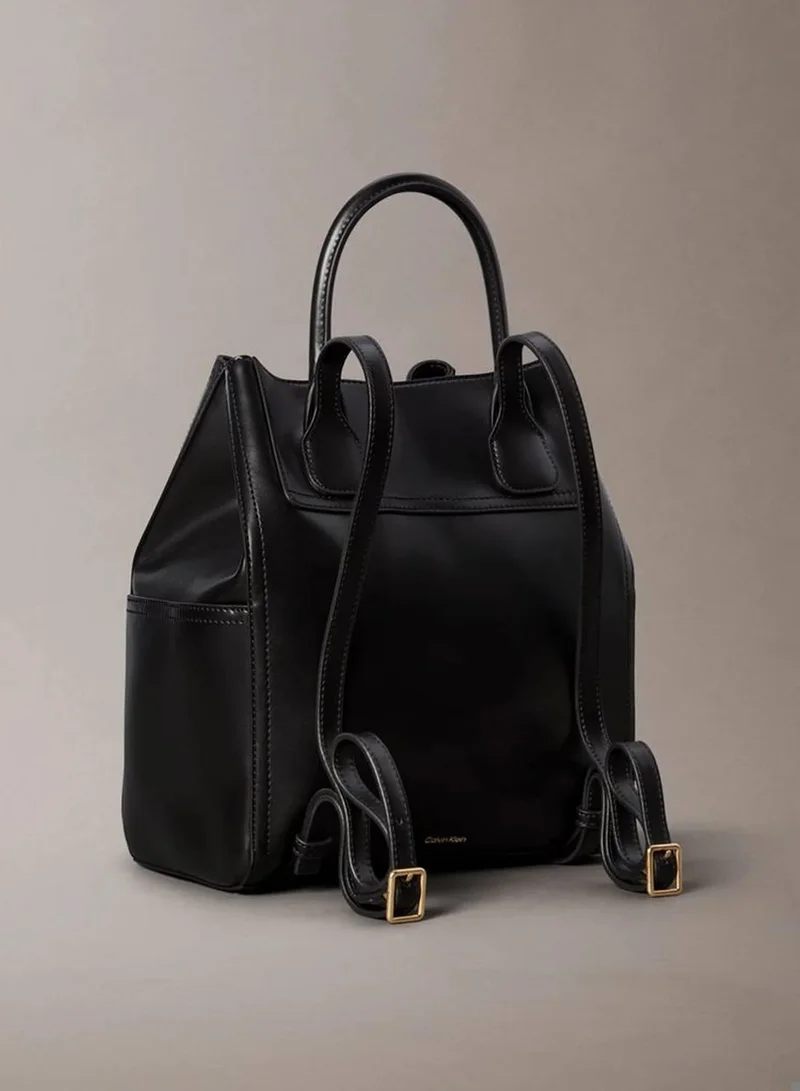 Calvin Klein BLACK / ANTIQUE LIGHT GOLD Monogram Drawstring Backpack for Women | Best Price UAE