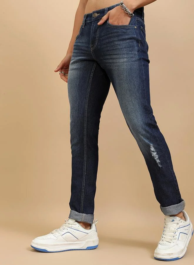 HIGHLANDER Mid Rise Slim Fit Faded Jeans with Distress Detail by Styli