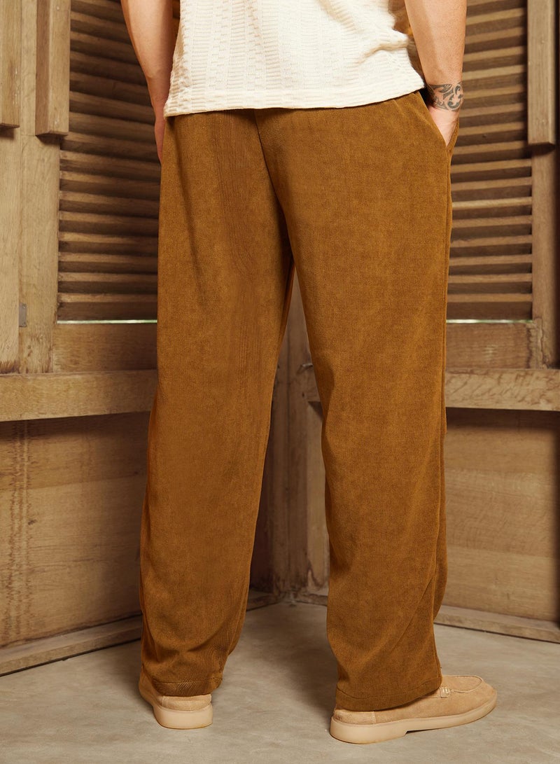 Campus Sutra Men's Russet Brown Corduroy Pleated Trousers  - Image 5