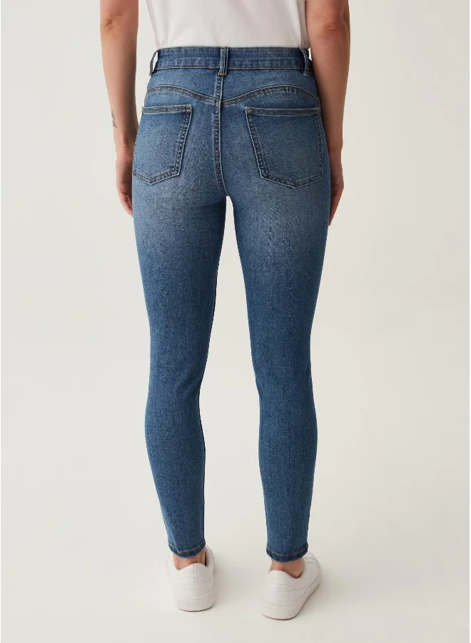 او في اس Skinny-fit stretch jeans