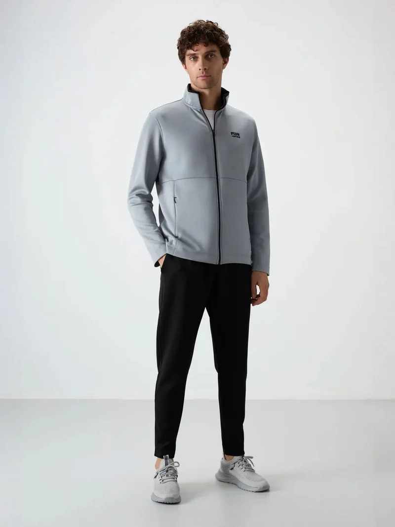 تومي لايف TOMMY Men's Polyester Scuba Active Set With Zip Collar