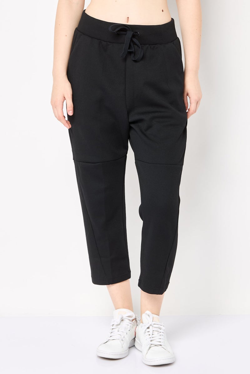 Reebok Women Sportswear Fit Brand Logo Outdoor Sweatpants, Black - Image 1