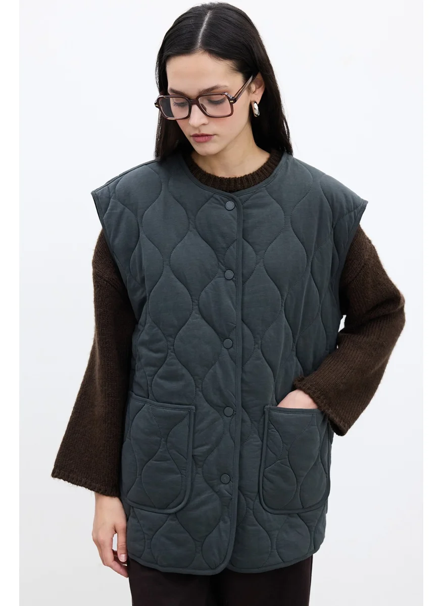 مانوكا Buttoned Short Quilted Coat Green