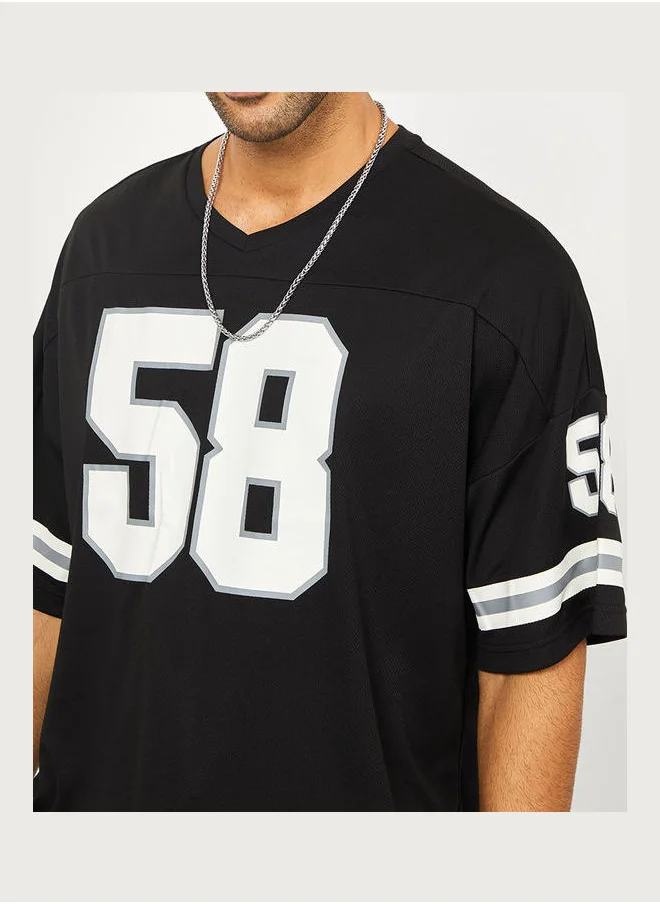 Styli Varsity Print Mesh Knit Oversized Tshirt