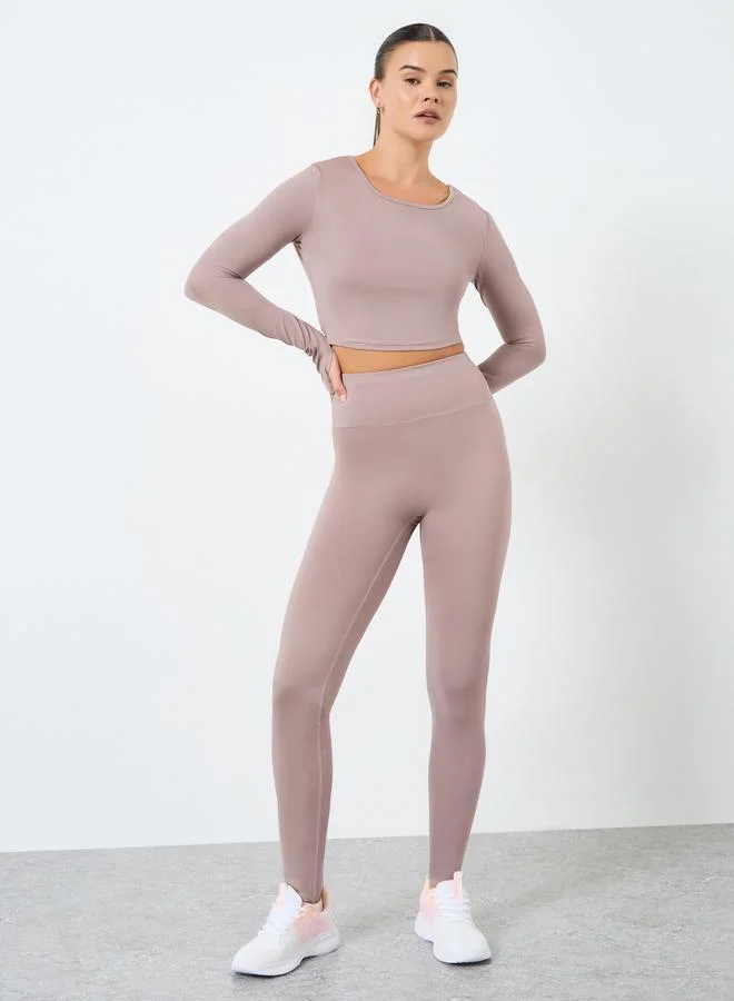 Styli Active Back Twist Peep Detail Crop Top and Leggings Set