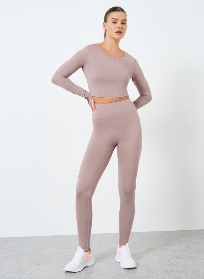 Styli Active Back Twist Peep Detail Crop Top and Leggings Set - Image 1
