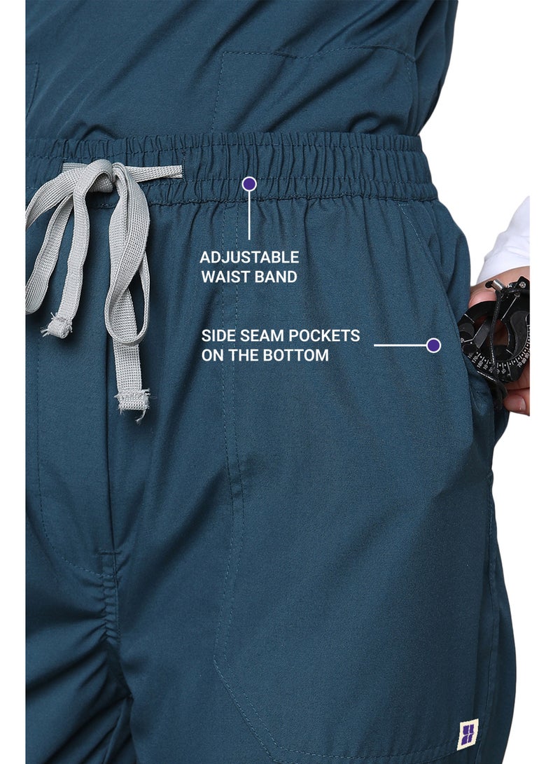 KNYA زيّ طبي نسائي كلاسيكي من KNYA بخمسة جيوب | ياقة على شكل حرف V | تصميم مرن ومريح للجزء العلوي والسفلي | جيوب يسهل الوصول إليها | زيّ موحد للأطباء | أخضر غامق (مقاس L) - Image 4