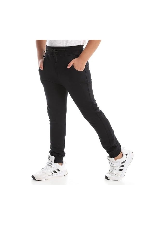 Modern trousers with side pockets in black, heavy-duty diving fabric, sizes 9-10 years - Image 2