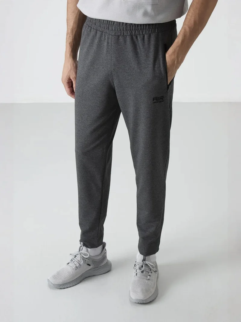 تومي لايف TOMMY Men's Solid Jogger Sweatpants