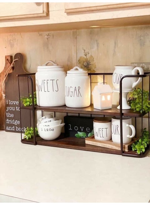 New Coffee Rack is elegant and modern. Enjoy the elegance of the practical design that combines durable metal and 3 strong wooden shelves, giving you a distinctive decorative piece in the kitchen or reception.(Ar)