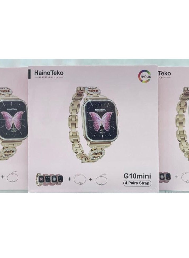 Haino Teko - A women's watch with 4 interchangeable shoes + 2 gift bracelets, featuring the G10 MINI watch 42mm AMOLED screen 4 replacement bands + 2 gift bracelets Make phone calls directly from the watch. Receive notifications from different applications. Heart rate monitoring. Track sports activities. Measuring body temperature. Audio control. Find the phone. Alerts. Stopwatch. Pedometer. Calorie counter. water resistant. Voice assistant. The watch supports the Arabic language. Elegant and modern design - Image 1