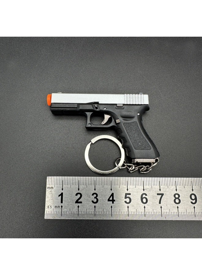 Mini Metal Gun Shape Key Chain - Image 3