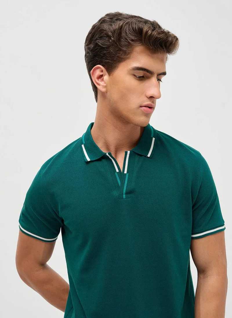 Urbano Fashion  Urbano Fashion Men's Teal Green Solid Regular Fit Half Sleeve Cotton Polo T-Shirt for Men | Best Price UAE