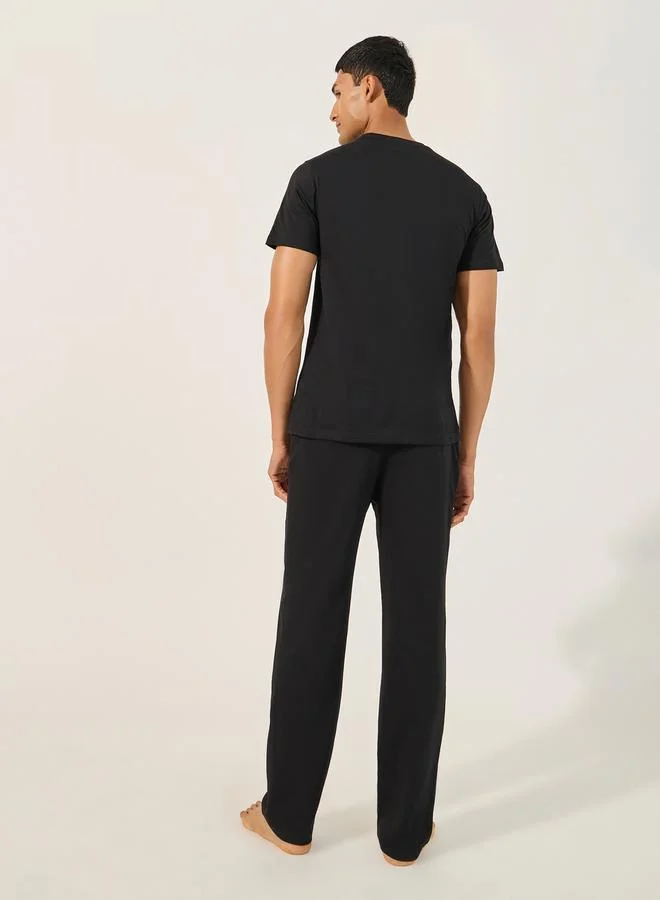 Styli Solid Crew Neck T-Shirt and Printed Waistband Pyjama Set