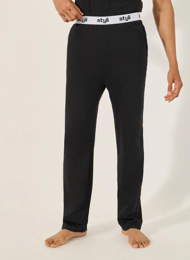 Styli Solid Crew Neck T-Shirt and Printed Waistband Pyjama Set