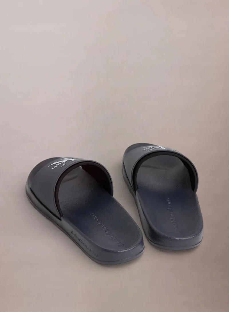 Calvin Klein Ck Navy Norwich - Contoured Logo Sliders for Men | Best Price UAE