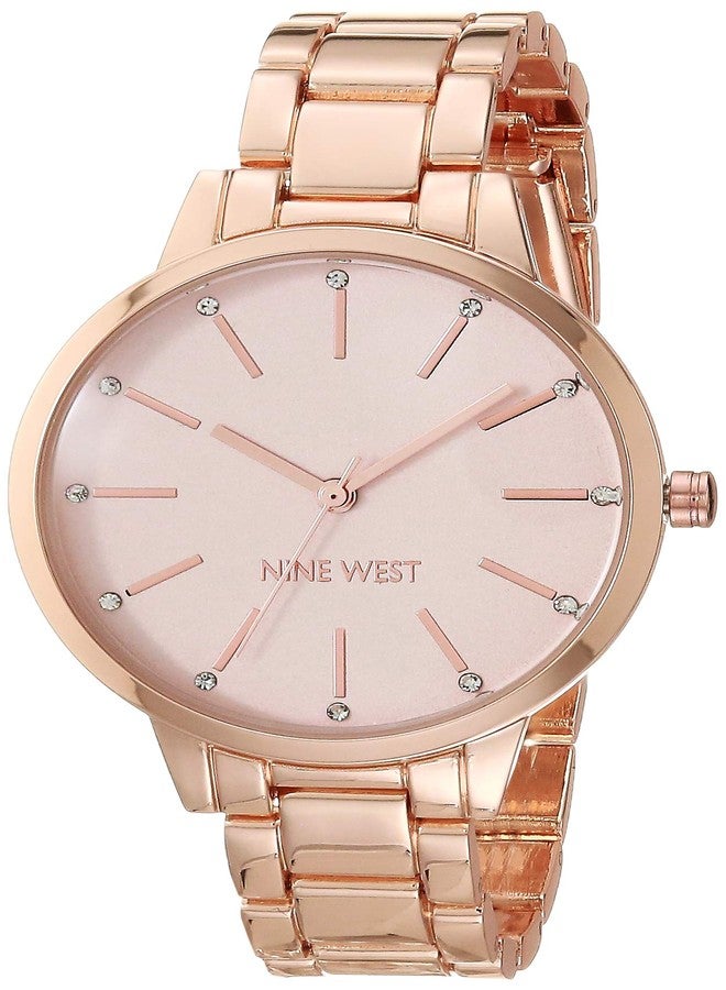 Nine West Women's Crystal Accented Bracelet Watch, Pink/Rose Gold, Quartz Movement - Image 1