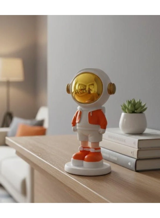 أي كي دي سي ديكور AKDC الخزفي لرائد فضاء صغير، ١٦ سم، باللونين الأبيض والبرتقالي | منحوتة فنية زخرفية لرائد فضاء صغير - Image 2