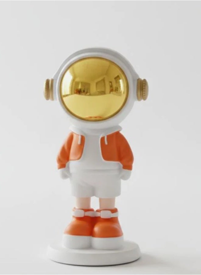 أي كي دي سي ديكور AKDC الخزفي لرائد فضاء صغير، ١٦ سم، باللونين الأبيض والبرتقالي | منحوتة فنية زخرفية لرائد فضاء صغير - Image 1