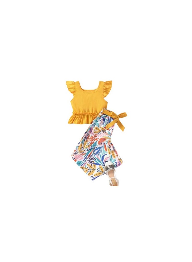 Girls' set consisting of a yellow T-shirt and floral pants 