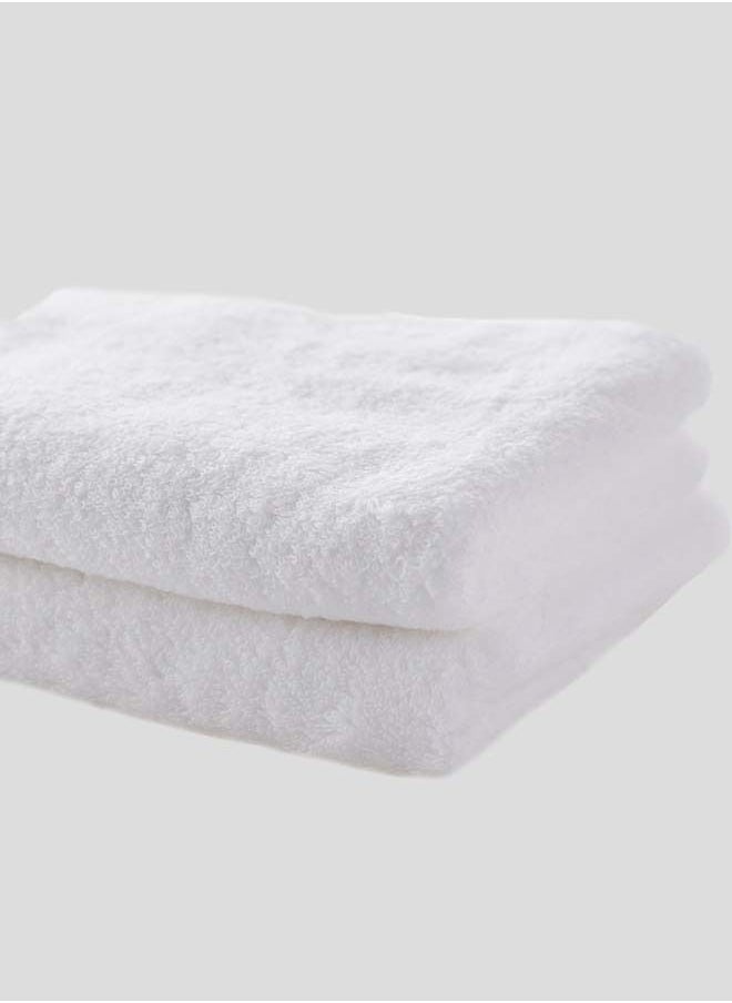 Banotex - Body towel set consisting of two pieces plain white size (50 * 80) 100% Egyptian made made of the finest high-quality cotton to give softness and fast absorption characterized by its edges which adds a touch to its appearance - Image 1