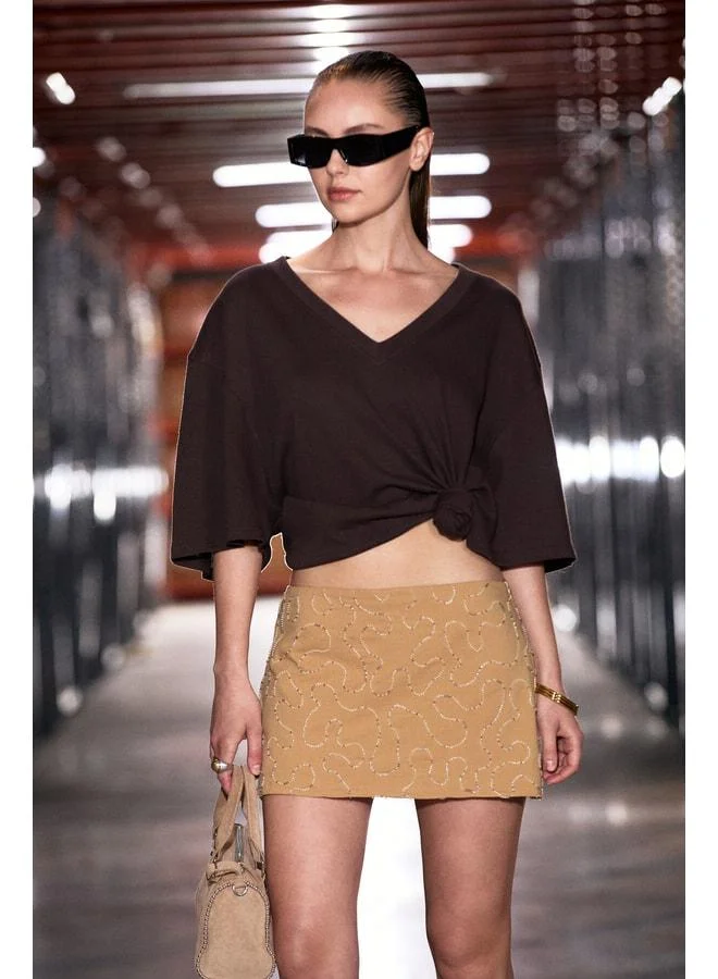GRIMELANGE VANDAL Women's 100% Organic Cotton Deep V-Neck Oversized Brown T-Shirt.