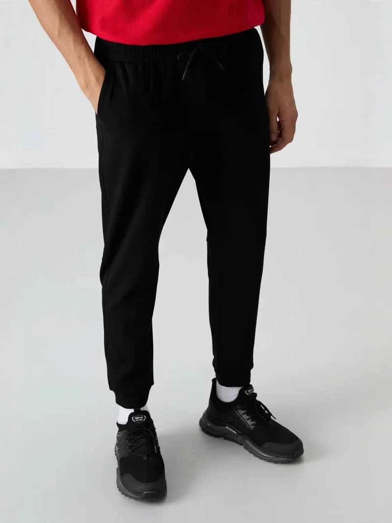 تومي لايف TOMMY Men's Fleece Jogger Sweatpants