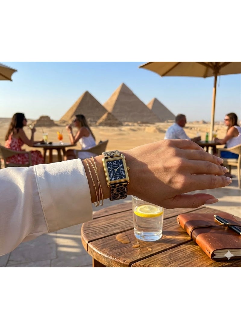 كارترز ساعة يد نسائية كارترز تانك أنالوج بهيكل ذهبي وميناء أسود بأرقام رومانية وحزام شبكي بطبعة فهد - Image 2
