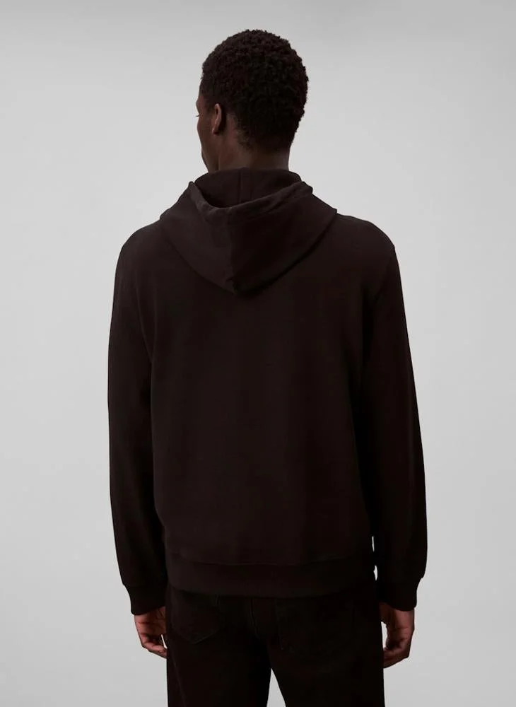 كالفن كلاين سويت شيرت بأكمام طويلة وطبعة شعار