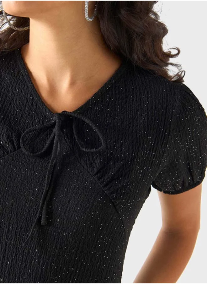 2Xtremz Textured Tie-Up Neck Top