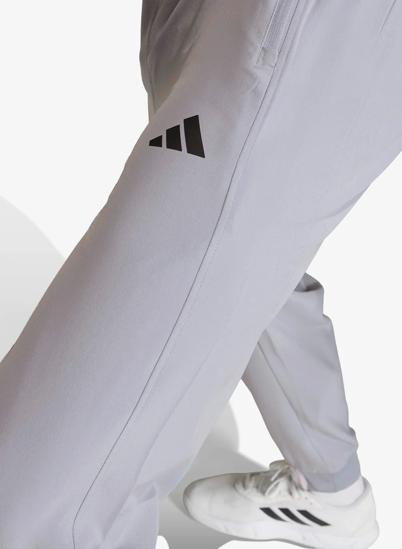 Adidas HALSIL Workout Essentials Flex Woven Pant for Men | Best Price UAE