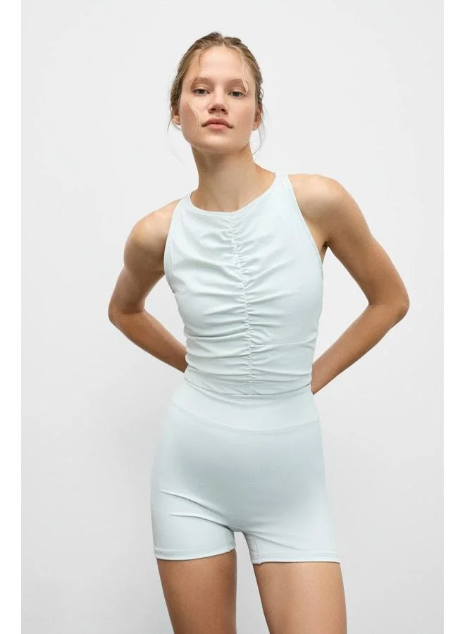 URBAN BEAT MOVEXA Women's Stretchy and Soft-Textured Round-Neck Bustier with Front Ruching and Halter Back in Gray.