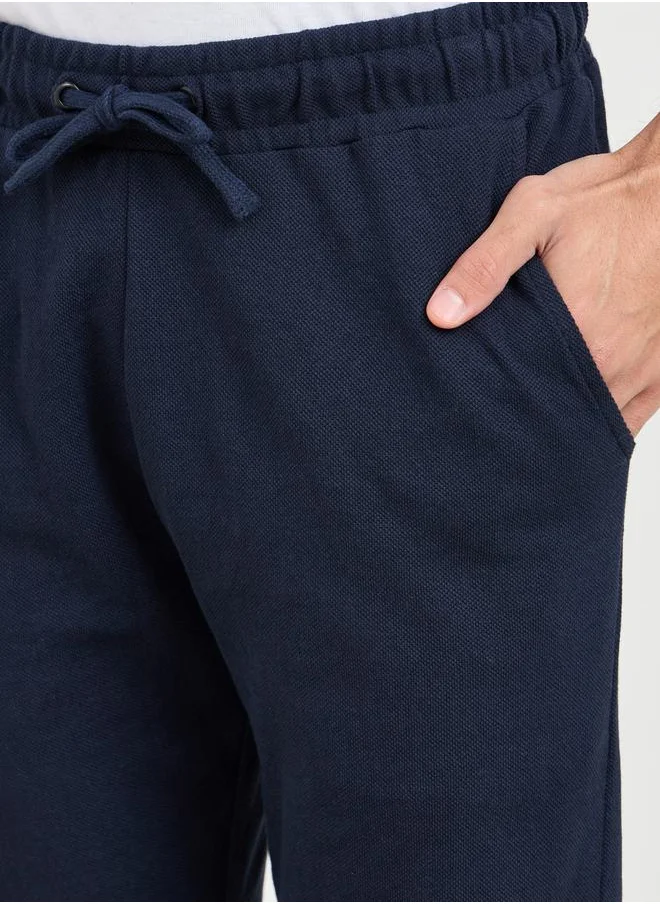 Styli Slim Fit Pique Knit Pants with Roll Up Hem