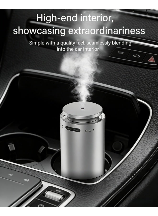 موزع زيوت عطرية محمول للسيارة، 3 سرعات قابلة للتعديل، عمر بطارية 7 أيام، جهاز علاج عطري صغير الحجم 7 × 13.7 سم لحامل أكواب السيارة، نشر عطري بزاوية 360 درجة للمنزل والحمام والفندق (فضي، M22) - Image 1