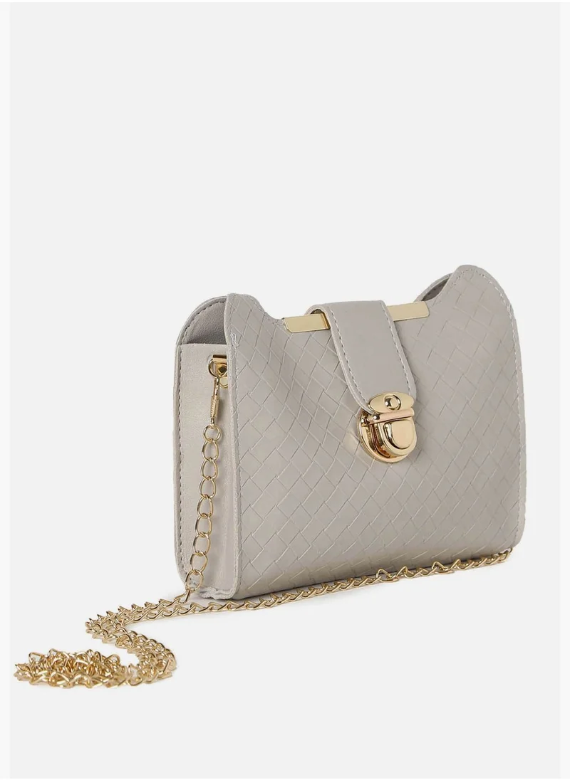 Haute Sauce Textured Push Lock Sling Bag with Chain Strap