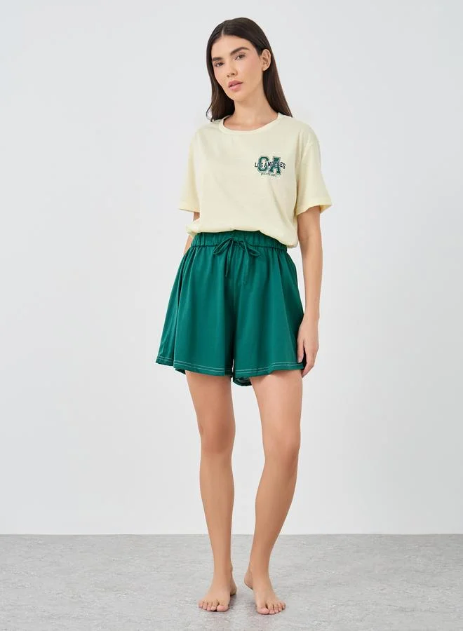 Styli Styli LA Back Graphic Drop Shoulder T-Shirt and Shorts Set