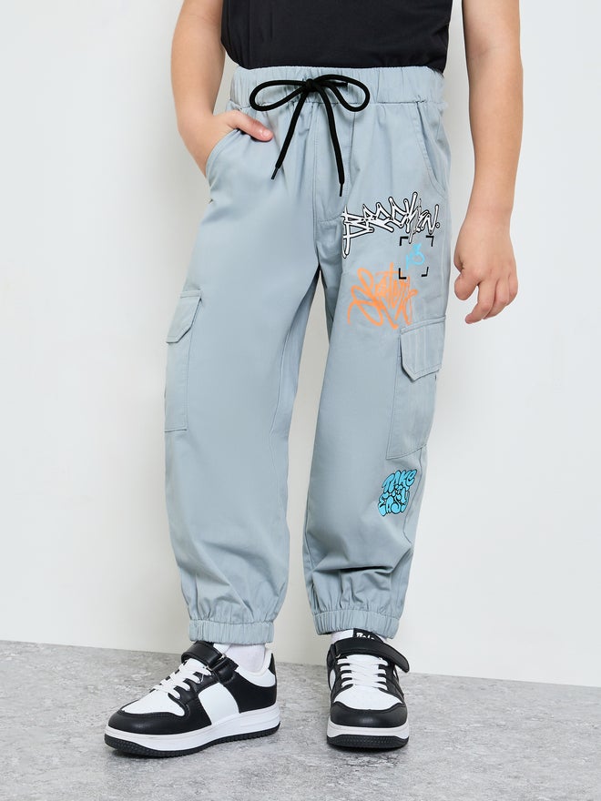Styli Boys Graffiti Print Cargo Joggers - Image 1