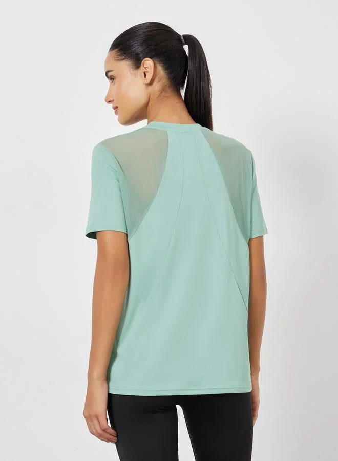 Styli Active  Back Mesh And Seam Detail Top for Women | Best Price UAE