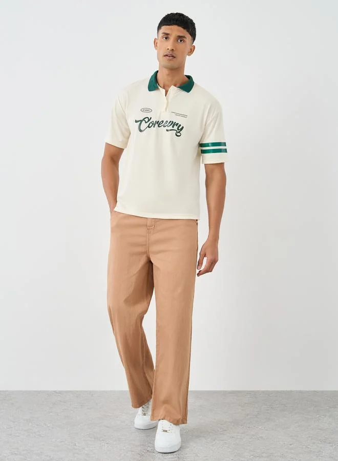 Styli Styli Oversized Varsity Print Polo Neck T-Shirt